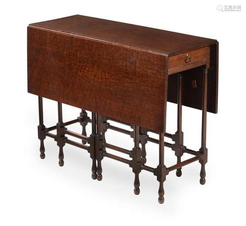 A GEORGE III FUSTIC MAHOGANY AND MAHOGANY 'SPIDER' GATE-LEG ...