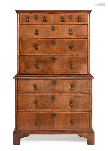 A GEORGE II WALNUT AND CROSSBANDED CHEST ON CHEST, CIRCA 173...