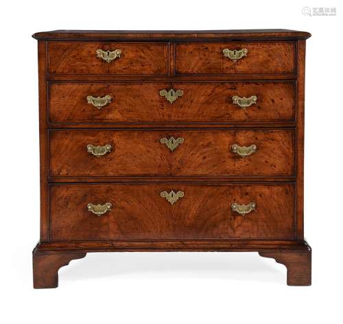 A GEORGE II WALNUT AND FEATHER BANDED CHEST OF DRAWERS, CIRC...