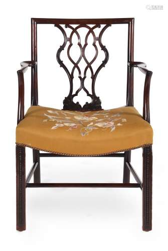 A GEORGE III MAHOGANY AND UPHOLSTERED OPEN ARMCHAIR, IN THE ...