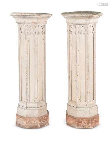 A PAIR OF CREAM PAINTED COLUMNAR PEDESTALS, IN THE GOTHIC TA...