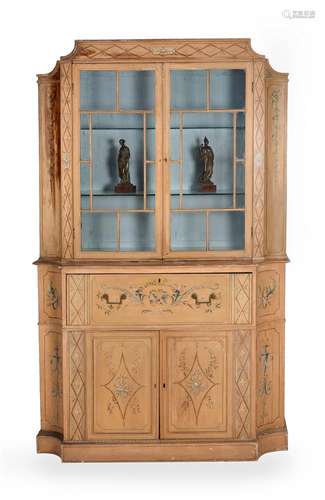 A GEORGE III POLYCHROME PAINTED BOOKCASE, IN THE MANNER OF W...