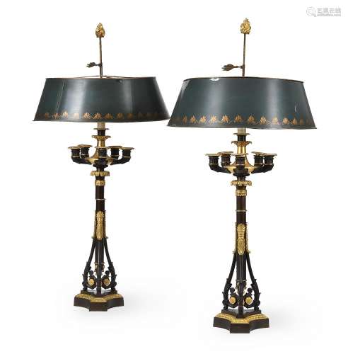 A PAIR OF RESTAURATION BLACK AND GILT PATINATED BRONZE FIVE-...