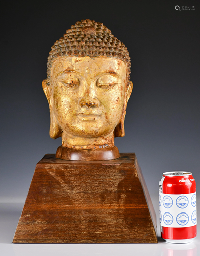 A Gilt Iron Buddha Head, with Stand, 19th C