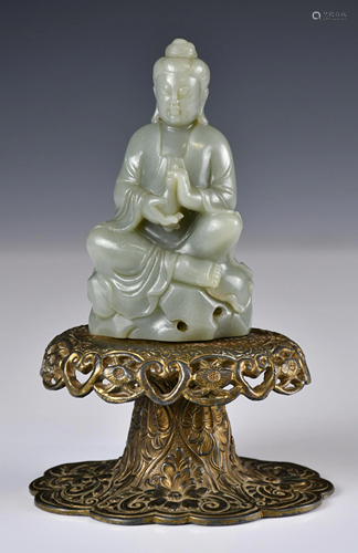 A Celadon Jade Carved Buddha, with Stand