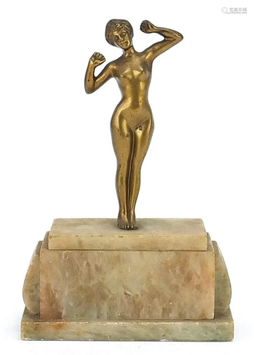 Art Deco nude figurine of a young lady standing on an