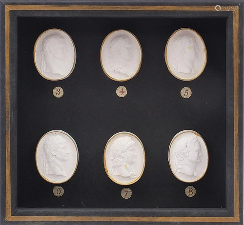 Framed display of six Grand Tour style plaster cameos,