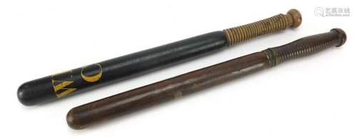 Two antique police truncheons comprising one with