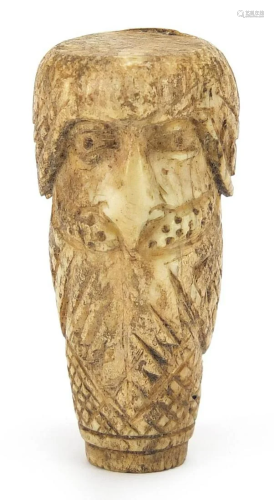 Anglo Saxon carved bone aestal in the form of a man's