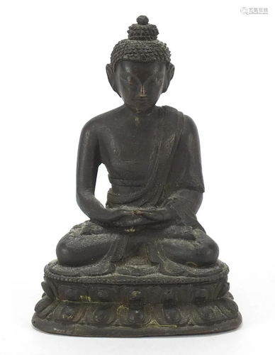 Chino Tibetan patinated bronze figure of seated Buddha,