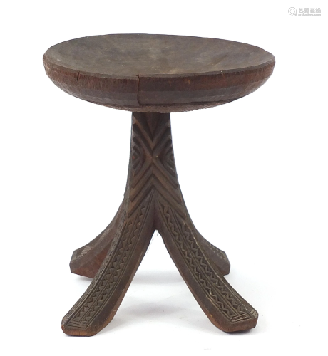 African tribal interest carved stool, 34cm high x 31cm