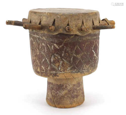 Tribal interest drum carved with geometric motifs, 29cm
