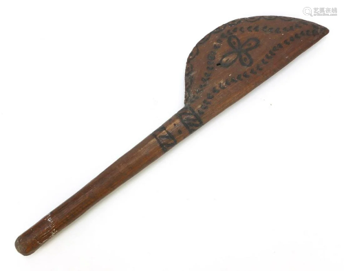 Tribal interest carved wooden paddle possibly