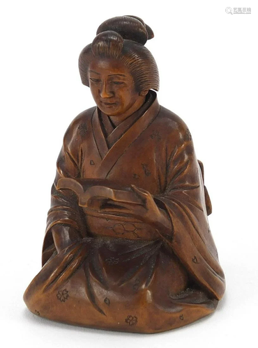 Japanese erotic carved hardwood okimono of a lady