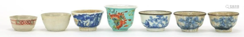 Seven Chinese porcelain tea bowls, including four blue