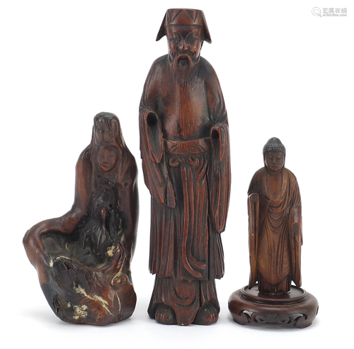 Three Chinese wood carvings including one of an elder