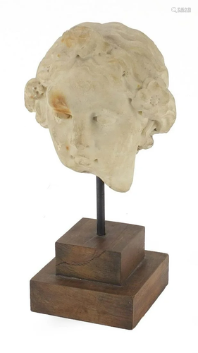 Antique carved white marble bust of a Roman head,