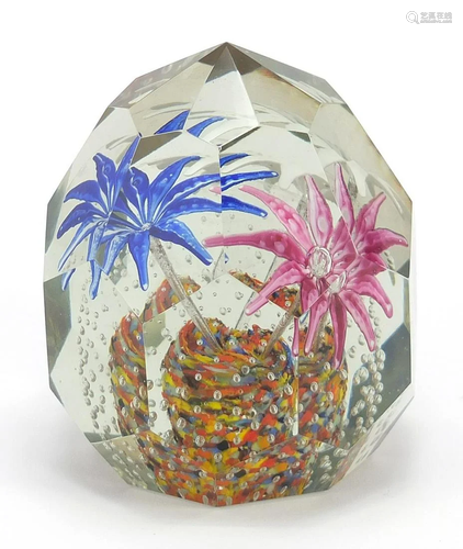 Multi facetted floral glass paperweight, 9cm high