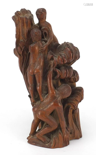 Antique treen carving of figures climbing a tree,