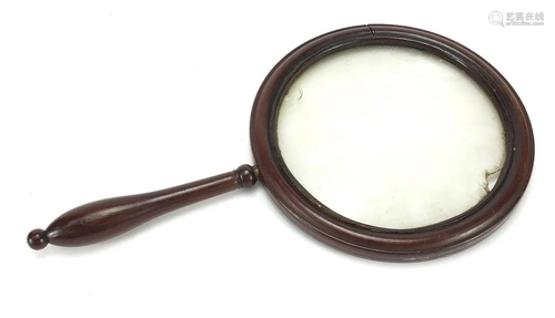 Antique mahogany gallery magnifying glass with turned