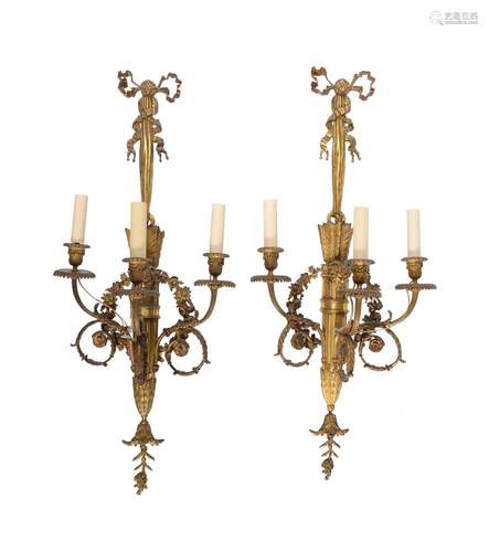 A PAIR OF FRENCH ORMOLU THREE-LIGHT WALL APPLIQUES, AFTER A ...