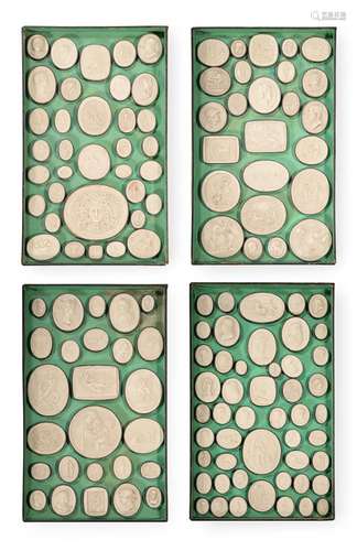 A SET OF FOUR TRAYS OF 'GRAND TOUR' PLASTER INTAGLIOS, MID 1...