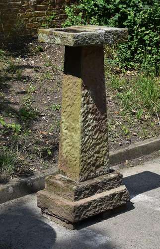 A CARVED RED SANDSTONE BIRD BATH, LATE 19TH/EARLY 20TH CENTU...