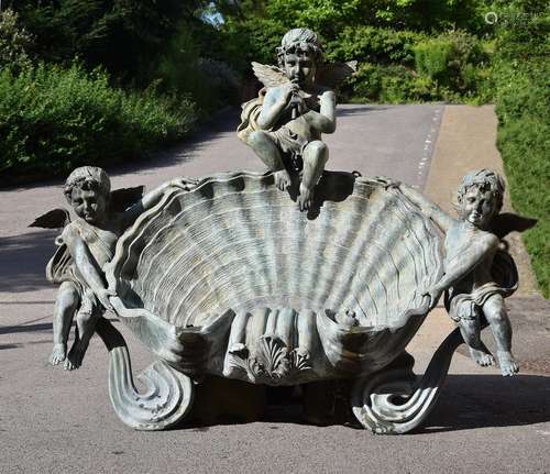 A LARGE BRONZE PUTTI AND SHELL WALL FOUNTAIN, 20TH CENTURY