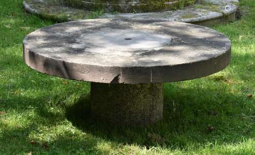 A CIRCULAR LOW TABLE WITH STONE TOP AND GRANITE BASE, 19TH C...