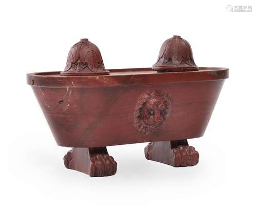 AN ITALIAN INKWELL IN THE FORM OF A ROMAN BATH IN ROSSO ANTI...