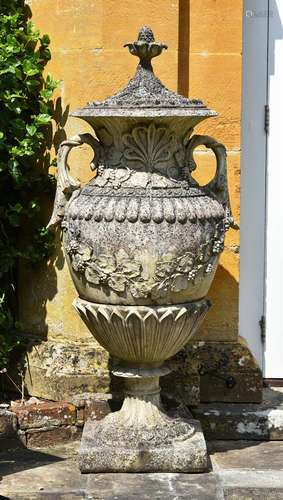 A PAIR OF MONUMENTAL COMPOSITION STONE LIDDED VASES, MID 20T...