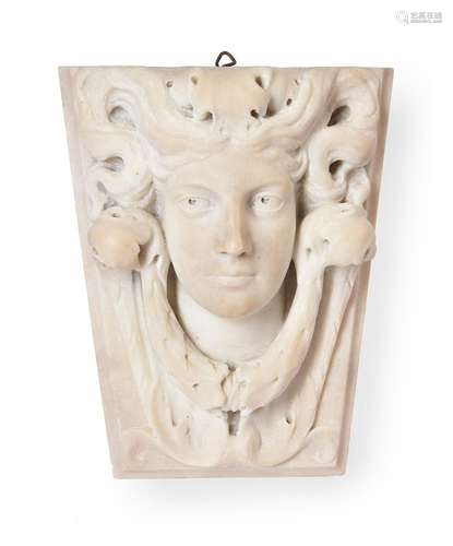 A MARBLE KEYSTONE WITH THE HEAD OF A BACCHANTE, 19TH CENTURY