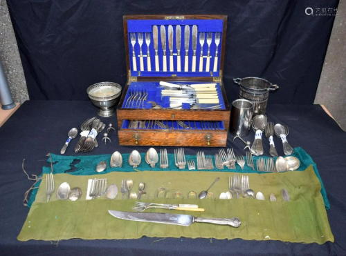 A boxed canteen of cutlery together with other plated
