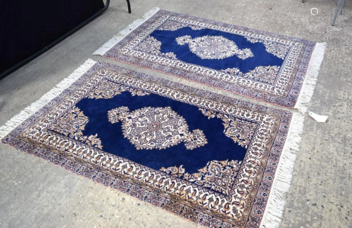 A pair of Persian rugs. 153 x 92cm