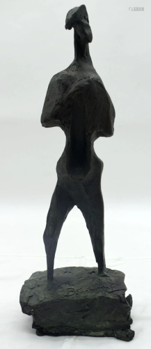 A signed abstract bronze of a male. 39cm.