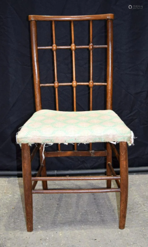 An Aesthetic period lattice back upholstered dining