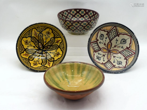 A collection of Islamic glazed terracotta bowls 8 x 20