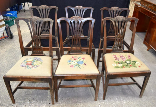 A collection of six wooden wheatsheaf splat back chairs