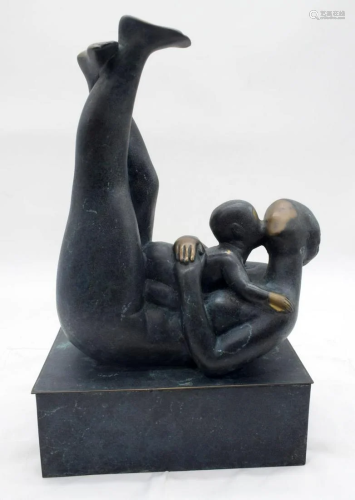 An abstract bronze depicting a female and a child 34cm.