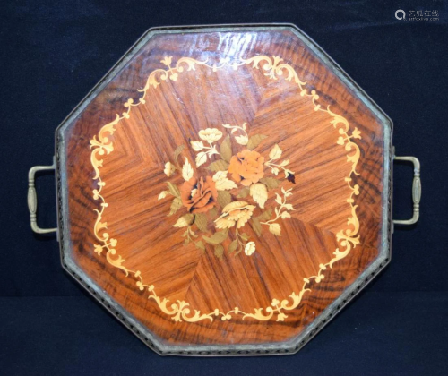 A large wooden inlaid brass bound tray with a floral