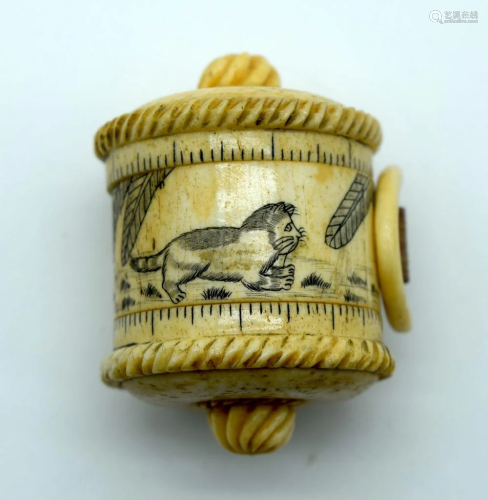 A small bone tape measure decorated with cats 5.5 cm.