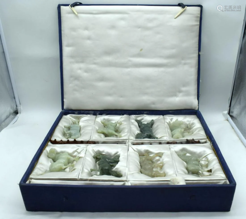 A boxed collection of Jade horses with stands 11cm (16)
