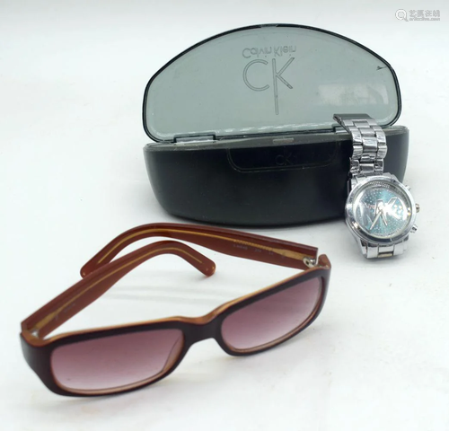 A vintage Calvin Klein cased sunglasses together with