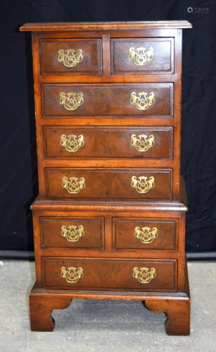 A mid-century wooden eight drawer hall cabinet. 86 x 43