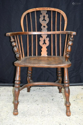 A small 19th century wooden Windsor chair. 87 x 57cm