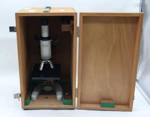 A boxed Prior microscope .