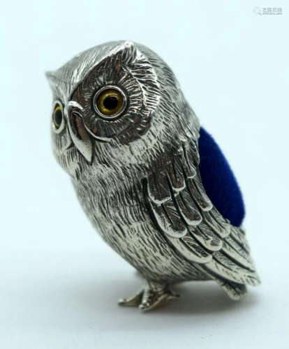 A silver owl pin cushion. 19.8cm 4cm.