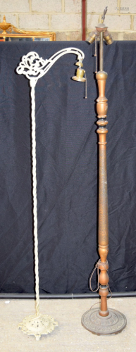 A cast iron lampstand together with wooden & metal