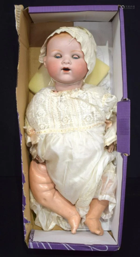 A German Armand Marseille porcelain doll 58cm