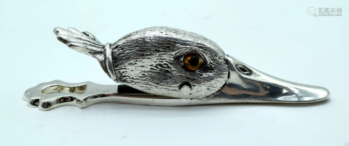 A silver plated letter clip in the form of a ducks